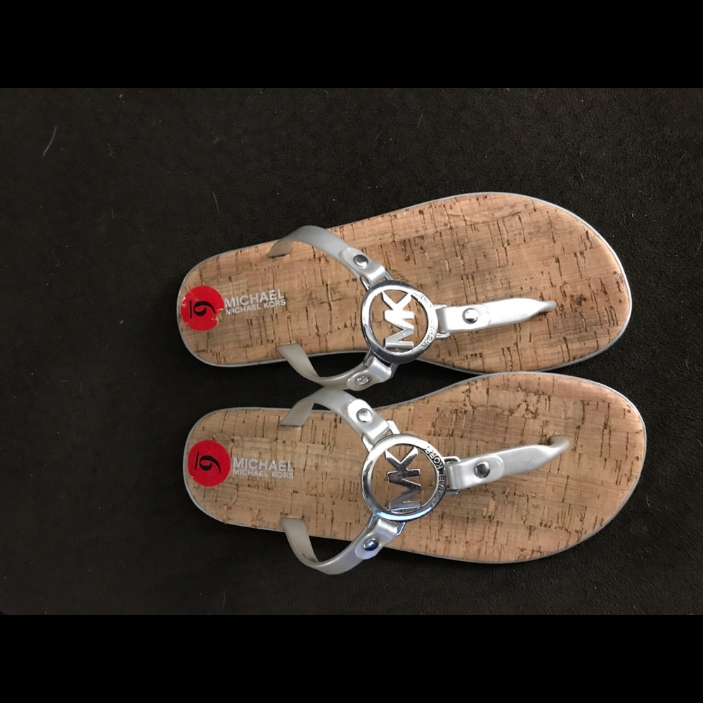 Women’s Michael Coors cork bottom sandals.